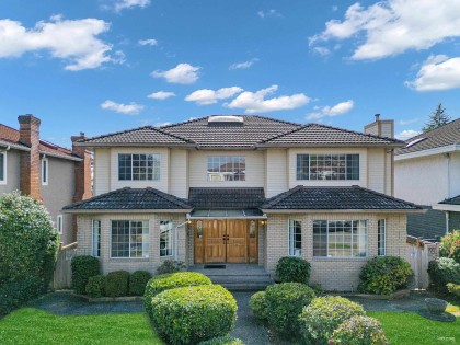 Photo 1 at 426 W 44th Avenue, Oakridge VW, Vancouver West