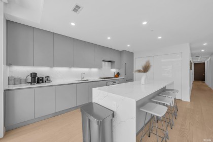 Photo 32 at 207 - 1331 Marine Drive, Ambleside, West Vancouver