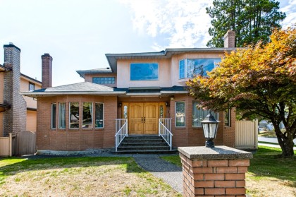 Photo 1 at 596 W 62nd Avenue, Marpole, Vancouver West